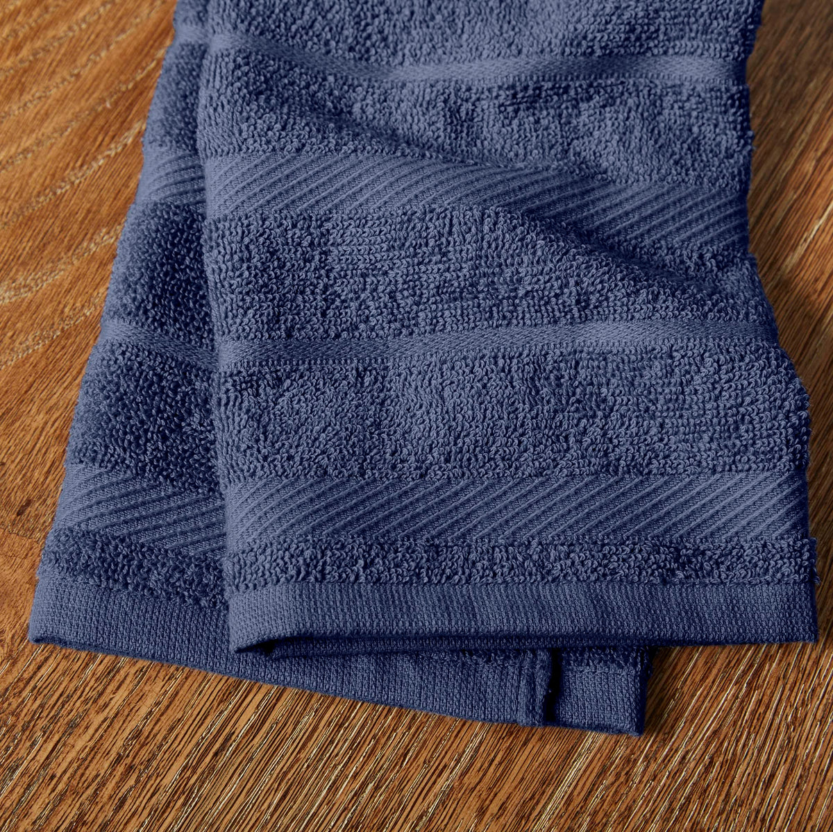 KitchenAid Albany striped towel adds color while drying cookware.