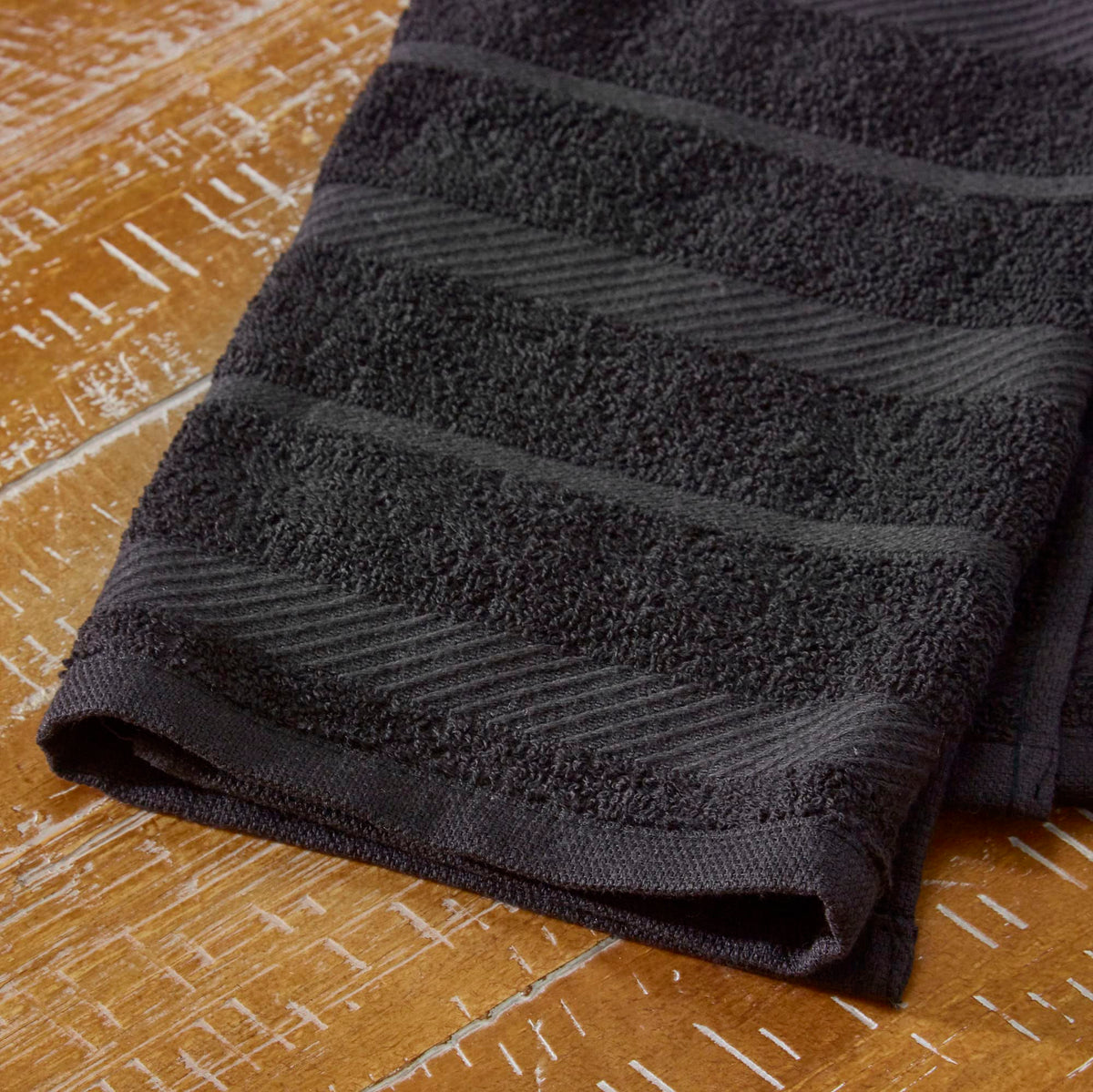 KitchenAid Albany towel displayed on hook for practical kitchen décor.