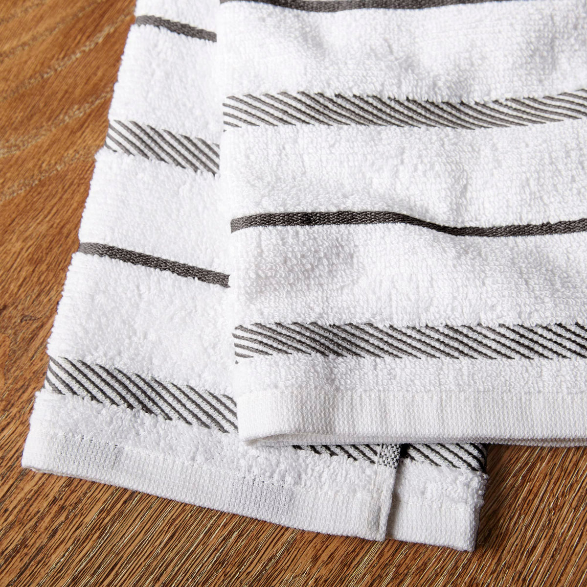 KitchenAid Albany towel drying glassware with a soft, non-abrasive touch.