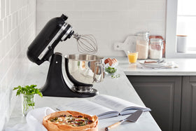 KitchenAid mixer offers 10 speeds for precise mixing, kneading, and whipping.