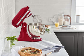 KitchenAid Artisan 5-Qt mixer kneads dough using the dough hook.