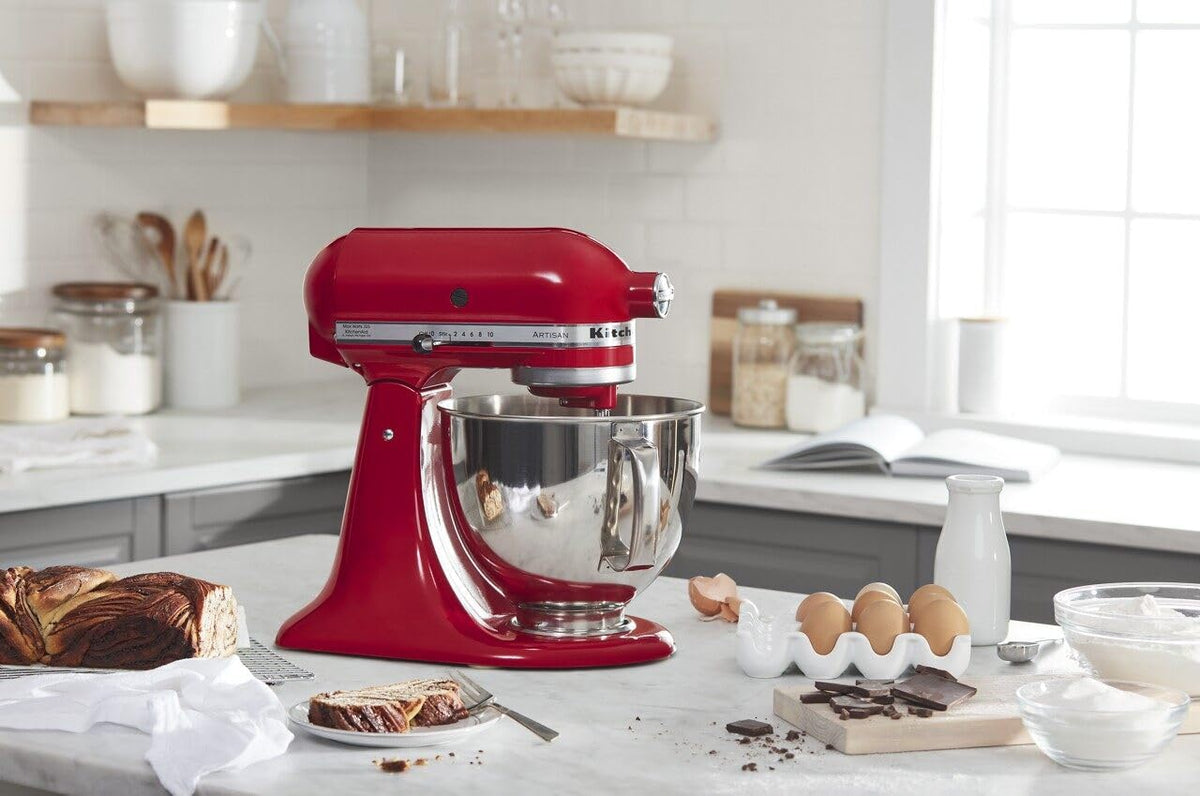 KitchenAid Artisan 5-Qt mixer with wire whip for airy whipped cream.