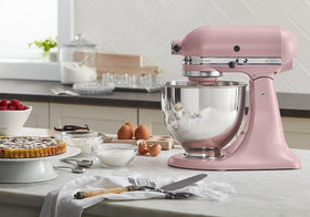 KitchenAid Artisan 5-qt stainless steel bowl shown for versatile large-batch mixing.