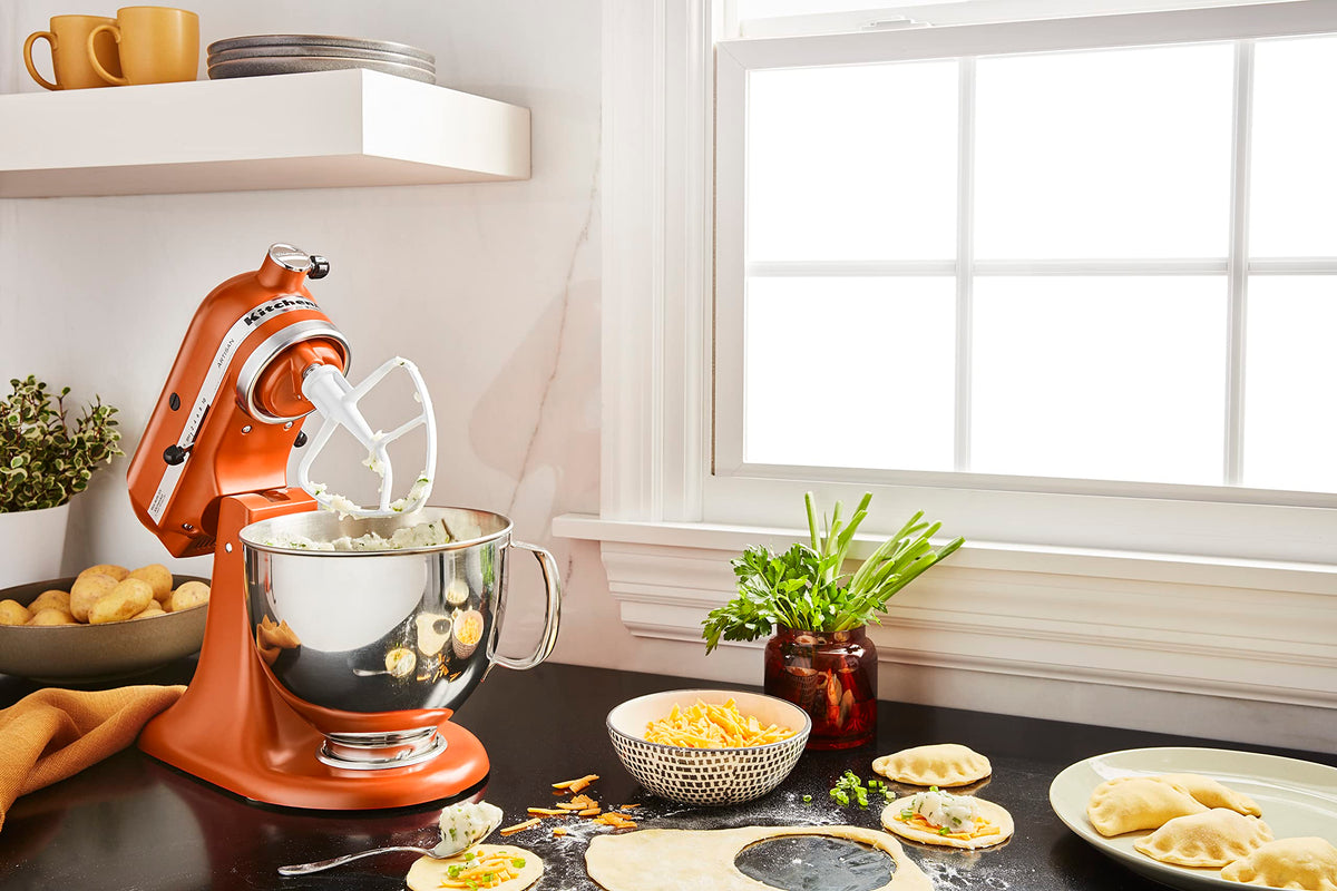 KitchenAid Artisan hub compatibility enables expanding attachments and recipes.