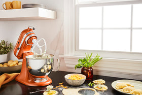 KitchenAid Artisan hub compatibility enables expanding attachments and recipes.