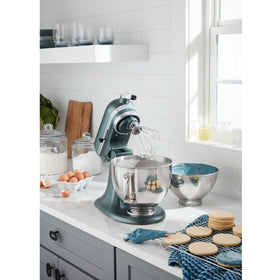 KitchenAid Artisan hub enables attachments like pasta makers and grinders to expand cooking options.