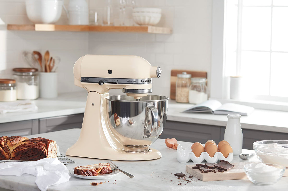 KitchenAid Artisan bowl with handle close-up for durable mixing.