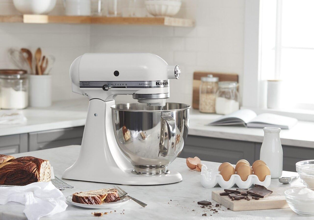 KitchenAid Artisan tilt-head mixer with 10 speeds for versatile textures.