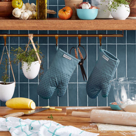 KitchenAid Asteroid mitt with textured silicone grips for secure handling of cookware.
