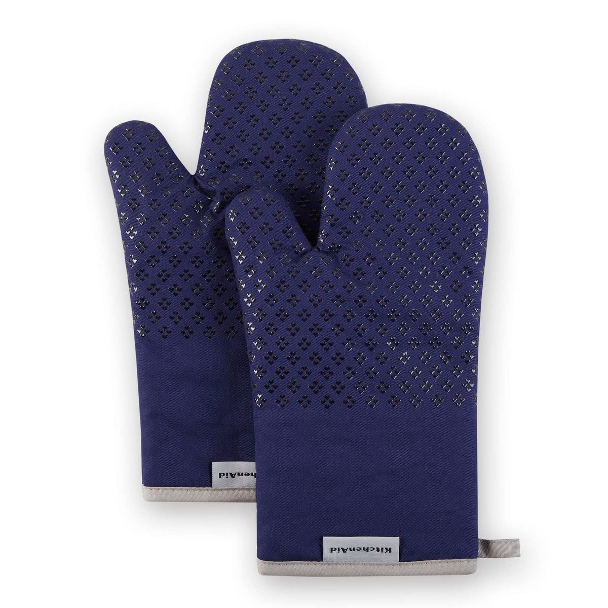 KitchenAid Asteroid oven mitts in cobalt blue shield hands during high-heat cooking