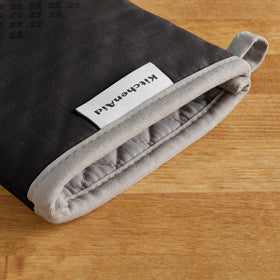 Soft cotton interior of KitchenAid Asteroid mitts for comfortable baking sessions.