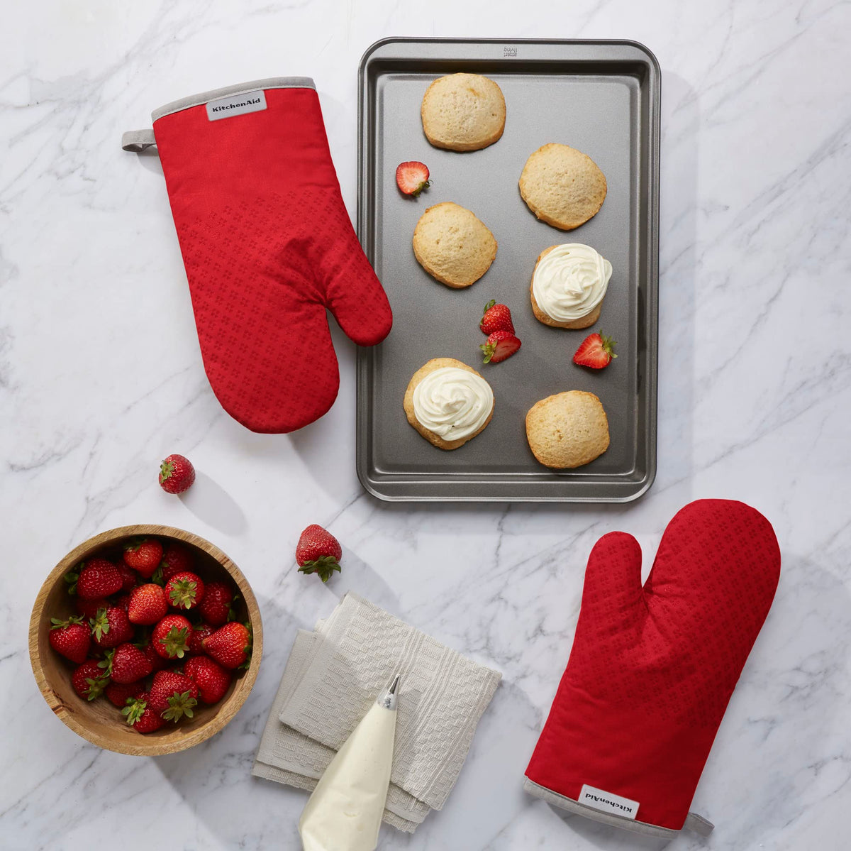 KitchenAid Asteroid mitts fire red feature textured silicone grips for a secure hold.