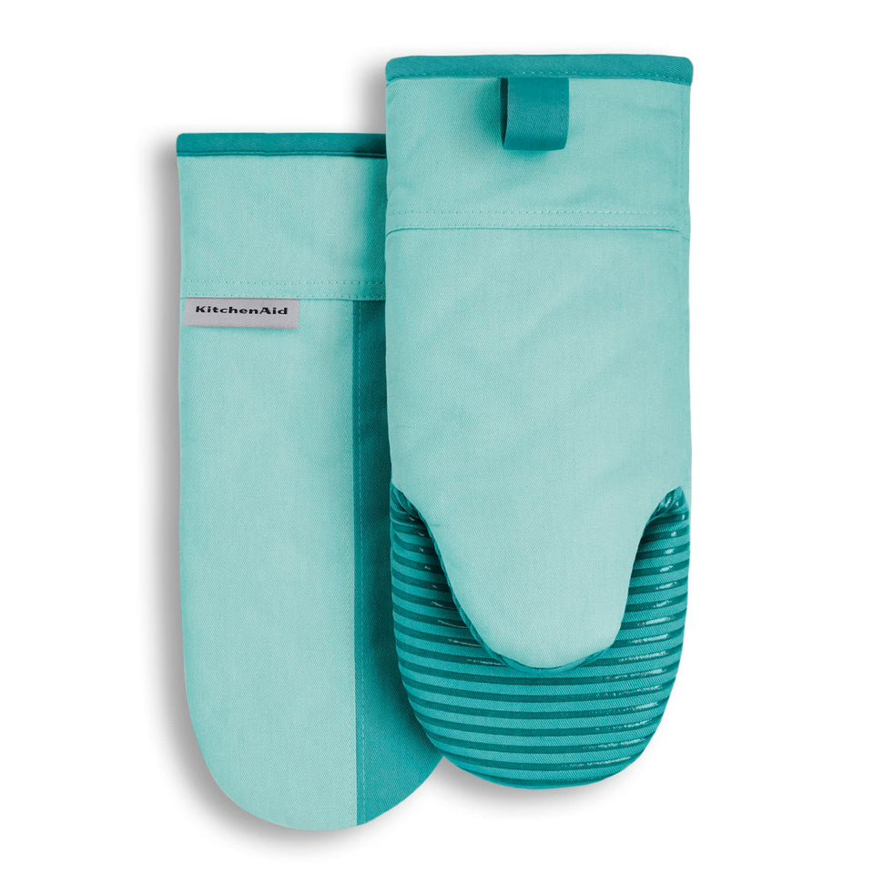 KitchenAid Beacon oven mitt Aqua Sky closeup shows heat-resistant cotton and secure grip.