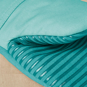 KitchenAid Beacon oven mitt Aqua Sky fabric detail and soft inner lining.