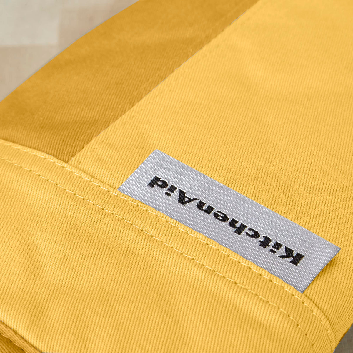 KitchenAid Beacon oven mitts measure 5.75 by 13 inches for comfortable handling
