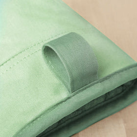 KitchenAid Beacon oven mitt pair with hanging loop for easy storage.