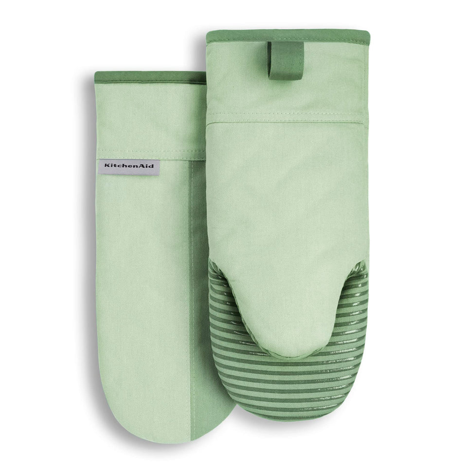 KitchenAid Beacon oven mitt set in pistachio and graphite for safe hot-pot handling.
