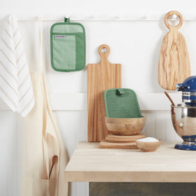 KitchenAid Beacon two-tone pot holder set in pistachio and graphite color