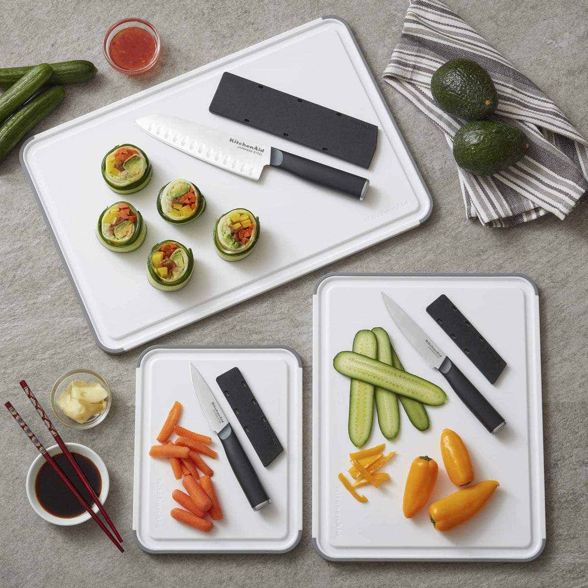 KitchenAid cutting board offers ample 12x18 prep space for vegetables.