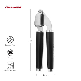 KitchenAid Classic Garlic Press basket shows large capacity for pressed garlic.