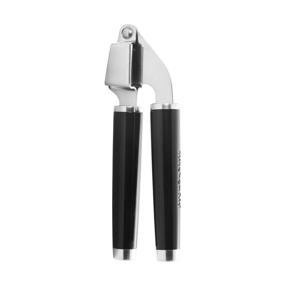 KitchenAid Classic Garlic Press chamber enables efficient crushing with a roomy chamber.