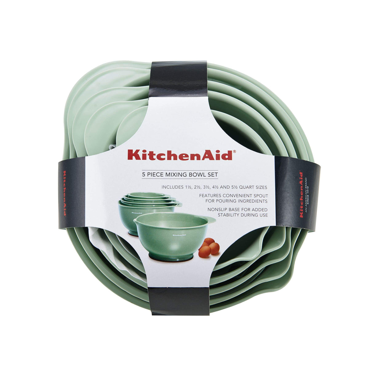 Vibrant pistachio KitchenAid mixing bowls brighten the countertop and workflow.