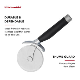 KitchenAid Classic Pizza Wheel in use slicing a hot pizza