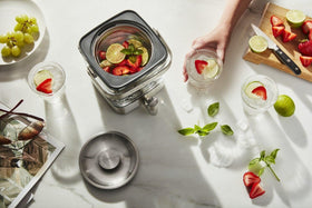 KitchenAid steeper with measurement lines guides consistent strength each batch.