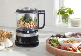 KitchenAid compact design with long cord for flexible countertop setup.