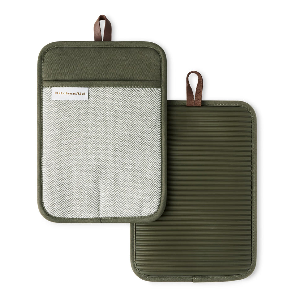 KITCHENAID Evergreen ribbed silicone potholder grip for secure handling of hot cookware.
