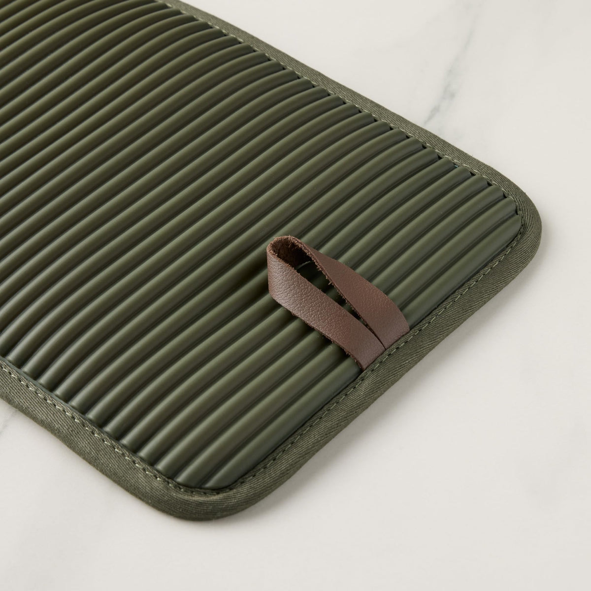KITCHENAID Evergreen versatile potholder as potholder, oven mitt, or trivet during kitchen tasks.
