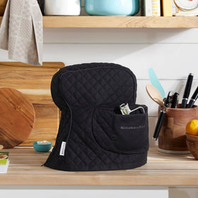 Quilted 100% cotton KitchenAid mixer cover for durable protection.