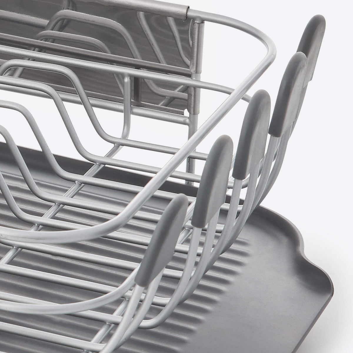 KitchenAid flatware caddy integrated with the rack keeps utensils organized while drying