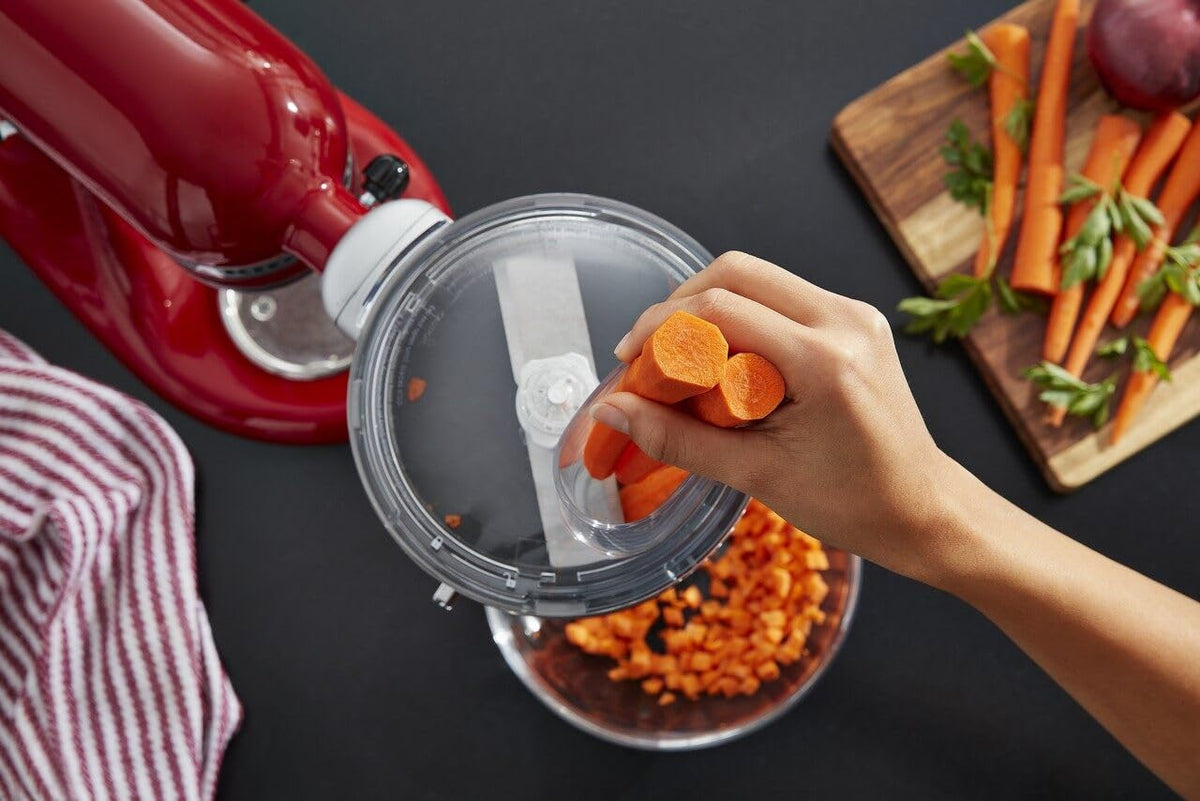 KitchenAid food processor slicing disc enables precise thick-to-thin slices for versatile dishes.