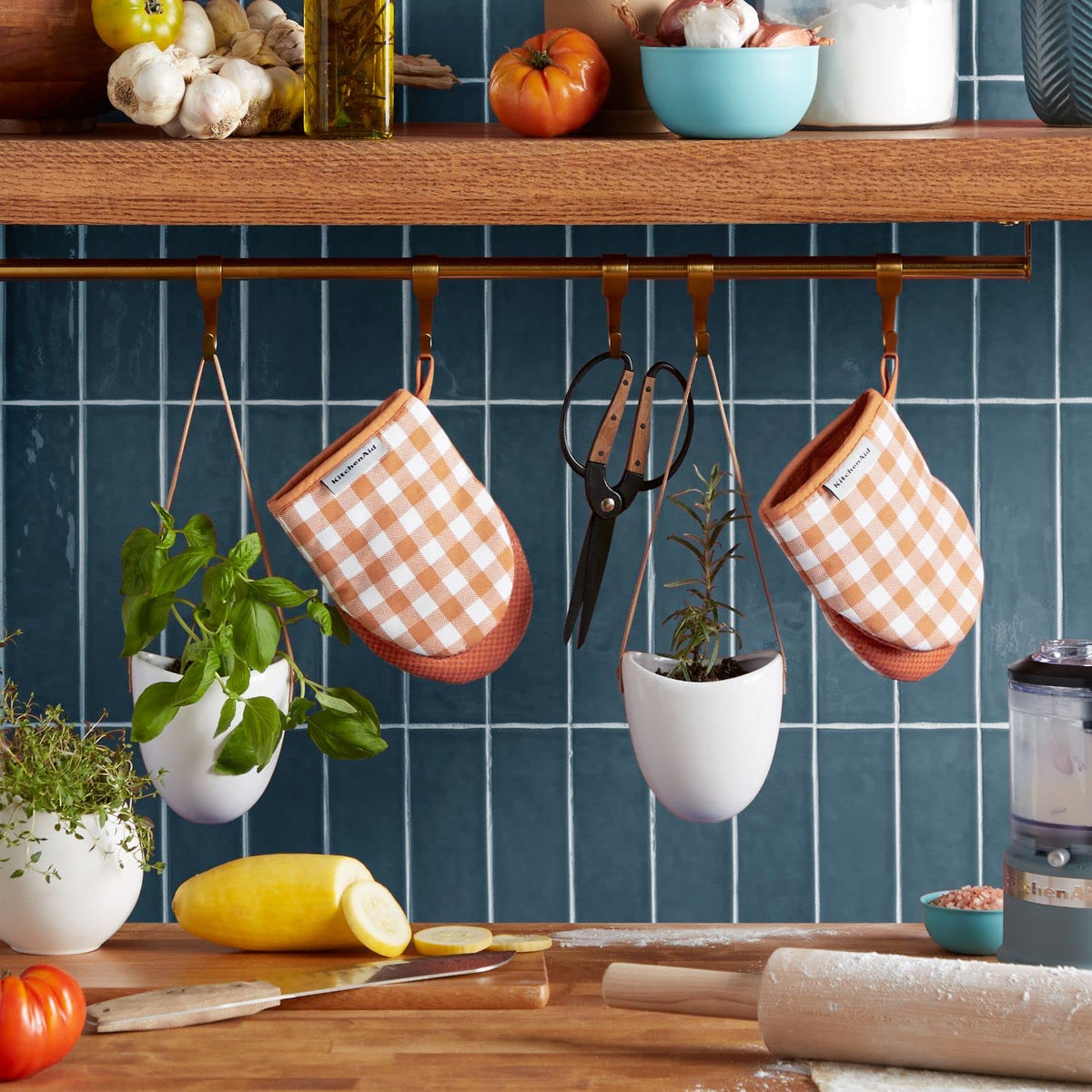 KitchenAid Gingham mini oven mitts close-up highlights silicone grip.