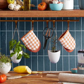 KitchenAid Gingham mini oven mitts close-up highlights silicone grip.