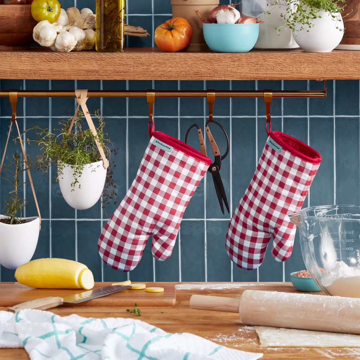 KitchenAid Gingham oven mitts double-pack close-up cotton texture shows heat-resistant material.