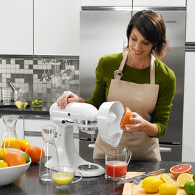 KitchenAid JE juice pouring into a pitcher for fresh juice.