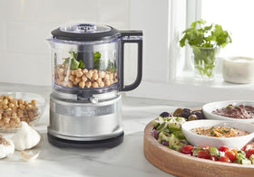 KitchenAid KFC3516CU drizzle basin aids emulsions for dressings and sauces.