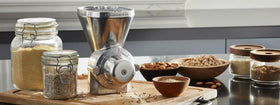 Cleaning brush included with KitchenAid KGM for easy maintenance