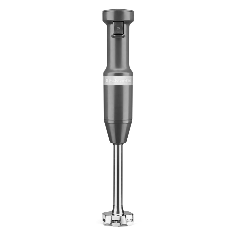 KitchenAid KHBV53 corded hand blender arm with 4-point blade for smooth blending.