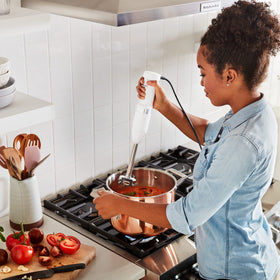 KitchenAid KHBV53 US-patented pan guard protecting cookware during blending.