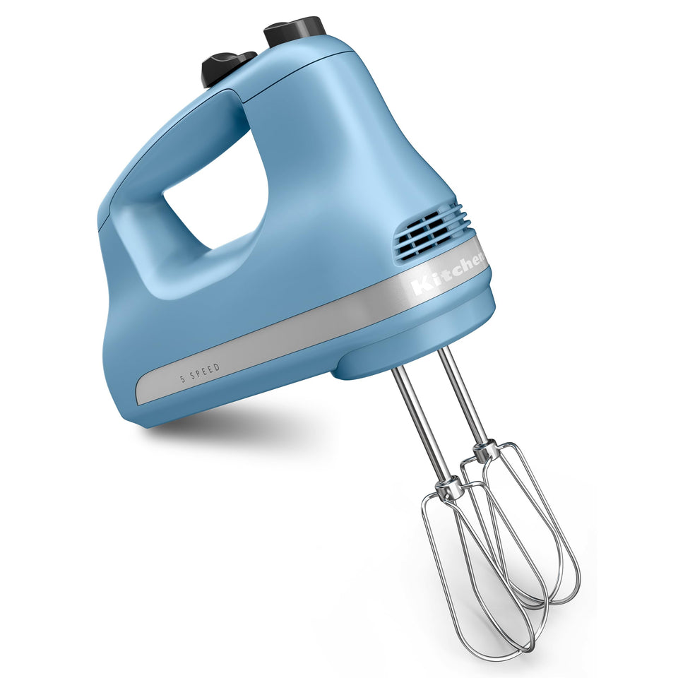 KitchenAid KHM512 Velvet Blue hand mixer with Turbo Beater accessories for smooth batter mixing.