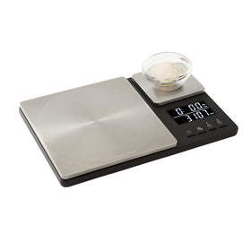 KitchenAid KQ909 battery compartment with included AAA batteries and auto-off feature.