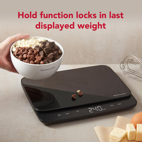 KitchenAid KQ917 tare function zeros containers for precise ingredient weighing.