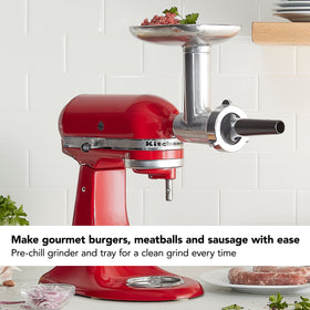 KitchenAid grinder in use processing meat for burgers and sausages at home.