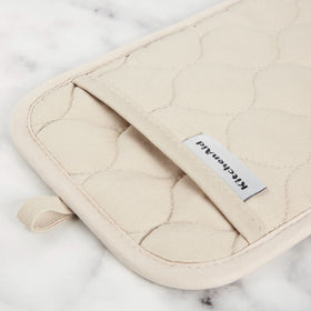 KitchenAid oven mitt with silicone grip enables non-slip handling of hot pans.