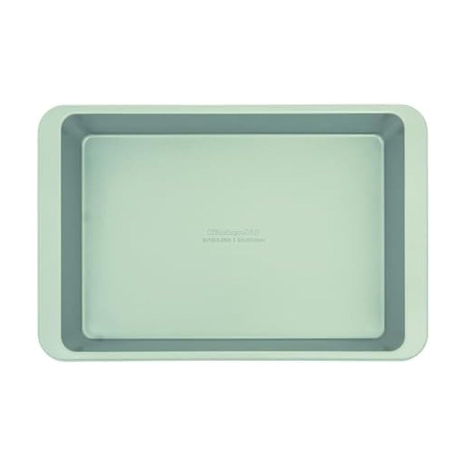 KitchenAid nonstick 9x13 cake pan in pistachio for effortless baking and release.