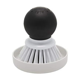 KitchenAid palm brush with dish tray—compact palm-friendly design for easy dish cleaning.