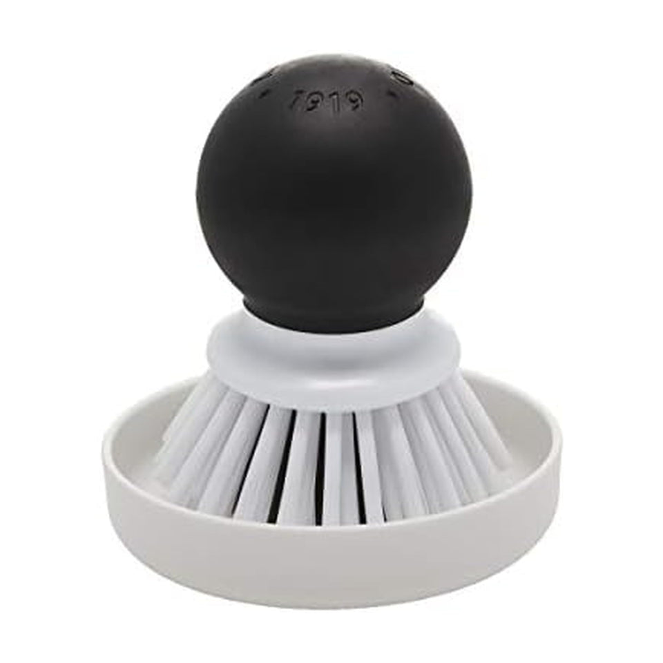 KitchenAid palm brush with dish tray—compact palm-friendly design for easy dish cleaning.